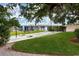 Beautifully landscaped grounds feature shuffleboard courts near the waterfront at 6415 Midnight Pass Rd # 502, Sarasota, FL 34242