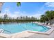 Large, inviting community pool with clear water and ample deck space for lounging and enjoying the Florida sun at 65 Tidy Island Blvd, Bradenton, FL 34210