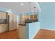 Open concept kitchen featuring granite counters and light wood cabinetry at 65 Tidy Island Blvd, Bradenton, FL 34210
