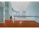 This loft boasts a vaulted ceiling with natural light and a fireplace for added warmth at 65 Tidy Island Blvd, Bradenton, FL 34210
