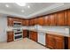Updated kitchen with stylish cabinets, stainless steel appliances, and a tile backsplash at 6916 W Country Club N Dr # 9B, Sarasota, FL 34243