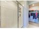 Modern bathroom featuring a glass enclosed shower with white tile and a peek at the walk-in closet at 7160 Amelia River Dr, Parrish, FL 34219