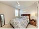 A cozy bedroom features a comfortable bed, a nightstand, and a full-length mirror at 7160 Amelia River Dr, Parrish, FL 34219