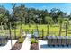 View of the community dog park with double gated entry and a place for your pets to run at 7160 Amelia River Dr, Parrish, FL 34219