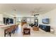 Bright, open-concept living room featuring stylish furnishings and ample natural light at 7160 Amelia River Dr, Parrish, FL 34219