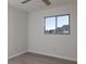 Bedroom with window for natural light and outdoor views at 8260 Berkeley Manor Blvd, Spring Hill, FL 34606