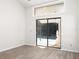 Bright living room with sliding glass doors at 8260 Berkeley Manor Blvd, Spring Hill, FL 34606