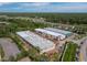 Aerial view of new commercial project showcasing buildings near surrounding residential areas at 829 57Th E St, Bradenton, FL 34208