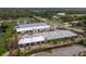 Aerial view of new commercial buildings in development with ample parking and road frontage at 829 57Th E St, Bradenton, FL 34208