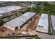 Aerial view of new construction showcasing buildings, surrounding area, and construction activity at 829 57Th E St, Bradenton, FL 34208
