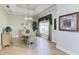 Elegant dining room featuring hardwood floors, decorative lighting and ornate furniture at 8315 Eagle Xing, Sarasota, FL 34241