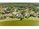 Beautiful home with mature trees and manicured lawn at 8315 Eagle Xing, Sarasota, FL 34241