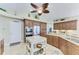 Well-equipped kitchen with a center island, stainless steel appliances, and ample cabinetry at 8315 Eagle Xing, Sarasota, FL 34241