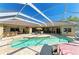 Spacious screened lanai with a pool, offering a perfect spot for outdoor entertainment at 8315 Eagle Xing, Sarasota, FL 34241