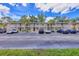 Two-story condo building featuring well-maintained landscaping, ample parking, and private entrances to each unit at 924 La Costa Cir # 4, Sarasota, FL 34237