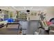 Spacious gym with various exercise machines and equipment, perfect for maintaining an active lifestyle at 924 La Costa Cir # 4, Sarasota, FL 34237