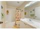 Bathroom featuring a shower-tub combo and single sink vanity at 9580 High Gate Dr # 1822, Sarasota, FL 34238