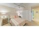 Bedroom featuring a ceiling fan and double closets at 9580 High Gate Dr # 1822, Sarasota, FL 34238