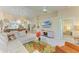 Bright living room with a fan and an open floor plan at 9580 High Gate Dr # 1822, Sarasota, FL 34238