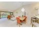 Open-concept living space with dining area at 9580 High Gate Dr # 1822, Sarasota, FL 34238