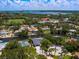 A lovely community with houses, luscious landscapes, canals, and gulf views at 1031 Contento St, Sarasota, FL 34242