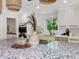 Bright kitchen showcasing stone countertops, undermount sink, modern appliances and backyard view at 1031 Contento St, Sarasota, FL 34242