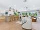 Bright, open living space featuring a modern kitchen and comfortable living area at 1031 Contento St, Sarasota, FL 34242