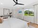 Bright main bedroom with neutral colors, modern decor, and natural light at 1031 Contento St, Sarasota, FL 34242