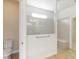 Modern bathroom features a glass-enclosed shower, neutral tile, and convenient bench seating at 11221 Sandhill Preserve Dr, Sarasota, FL 34238
