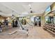 Fully-equipped community gym with modern exercise equipment and multiple TV screens at 11221 Sandhill Preserve Dr, Sarasota, FL 34238