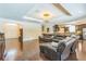 Bright living room features hardwood floors, recessed lighting, and plenty of space at 12398 Keyridge Loop, Largo, FL 33778