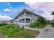 Condo building with tropical landscaping, clean curb appeal, and multiple units at 1319 Perico Point Cir, Bradenton, FL 34209