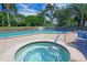 Enjoy the sunshine at the community pool and hot tub, perfect for relaxation and socializing at 1319 Perico Point Cir, Bradenton, FL 34209
