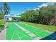 Outdoor shuffleboard court, perfect for friendly competition and outdoor enjoyment at 1319 Perico Point Cir, Bradenton, FL 34209