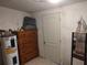 Basement utility room with storage; offers organizational solutions and extra space at 1423 17Th E Ave, Bradenton, FL 34208