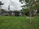 Mature tree in the yard providing shade and beauty around this cozy one-story home at 1423 17Th E Ave, Bradenton, FL 34208