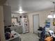 Functional kitchen space with gray cabinets and white appliances at 1423 17Th E Ave, Bradenton, FL 34208