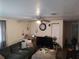 Comfortable living room featuring a plush sofa and large television at 1423 17Th E Ave, Bradenton, FL 34208