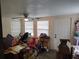 View of a cluttered multi-purpose room with natural light and ample storage space at 1423 17Th E Ave, Bradenton, FL 34208