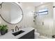 Sleek bathroom featuring modern fixtures, a walk-in shower, and contemporary design at 15815 Tradewind Ter, Bradenton, FL 34211