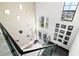 High angle view of the foyer with stairwell and elegant front door at 15815 Tradewind Ter, Bradenton, FL 34211
