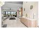 Spacious living room features stylish decor, sleek furniture, and large windows with scenic views at 15815 Tradewind Ter, Bradenton, FL 34211