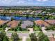 Stunning aerial view of a home with beautiful landscaping in a beautiful, landscaped community at 16628 Berwick Ter, Lakewood Ranch, FL 34202