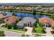 Desirable community home with lake view, mature landscaping, and proximity to neighborhood amenities at 16628 Berwick Ter, Lakewood Ranch, FL 34202