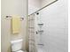 Shower with white subway tile walls, black trim and chrome fixtures at 16628 Berwick Ter, Lakewood Ranch, FL 34202