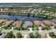 Desirable community home with lake view, mature landscaping, and proximity to neighborhood amenities at 16628 Berwick Ter, Lakewood Ranch, FL 34202