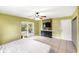 The bedroom features a decorative wall, tile flooring, and a ceiling fan at 17211 Drayton Ln, Port Charlotte, FL 33948
