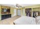 Spacious bedroom featuring a stone accent wall and open closet at 17211 Drayton Ln, Port Charlotte, FL 33948