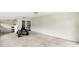 Spacious garage with ample storage, concrete flooring, and white walls at 17211 Drayton Ln, Port Charlotte, FL 33948