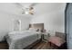 Inviting bedroom with light hardwood floors, a ceiling fan, and cozy furnishings at 2005 Gillespie Ave, Sarasota, FL 34234